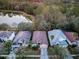 Aerial view of houses near a lake and road at 19144 Meadow Pine Dr, Tampa, FL 33647