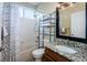 Well-appointed bathroom with granite vanity and updated shower at 19144 Meadow Pine Dr, Tampa, FL 33647