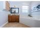 Bathroom with a vanity, soaking tub and window at 19144 Meadow Pine Dr, Tampa, FL 33647