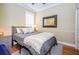 Cozy bedroom with a queen-size bed and plenty of natural light at 19144 Meadow Pine Dr, Tampa, FL 33647