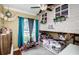 Charming bedroom with a unique loft bed and playful decor at 19144 Meadow Pine Dr, Tampa, FL 33647