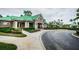 Community center entrance with landscaping and green roof at 19144 Meadow Pine Dr, Tampa, FL 33647