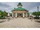 Relaxing gazebo with seating near the pool at 19144 Meadow Pine Dr, Tampa, FL 33647