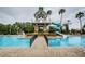 Resort-style pool with waterslide and deck at 19144 Meadow Pine Dr, Tampa, FL 33647