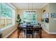 Bright dining area with wood table and window views at 19144 Meadow Pine Dr, Tampa, FL 33647