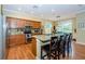 Modern kitchen with wood cabinets and granite countertops at 19144 Meadow Pine Dr, Tampa, FL 33647