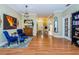 Elegant living room with hardwood floors and seating area at 19144 Meadow Pine Dr, Tampa, FL 33647