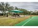 Community playground with shaded play area at 19144 Meadow Pine Dr, Tampa, FL 33647