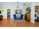 Cozy sitting area with blue armchairs and wooden cabinet at 19144 Meadow Pine Dr, Tampa, FL 33647