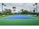 Outdoor tennis court with seating area at 19144 Meadow Pine Dr, Tampa, FL 33647