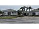 Building exterior showcasing landscaping and parking at 2333 Feather Sound Dr # B301, Clearwater, FL 33762