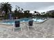 Inviting community pool with plenty of lounge chairs at 2333 Feather Sound Dr # B301, Clearwater, FL 33762