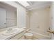 Clean bathroom with tub/shower combo, sink, and toilet at 2375 Lake Heather Heights Ct # 202, Dunedin, FL 34698