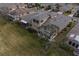 Aerial view showing home's back and side, highlighting its layout and location at 2431 Kensington Greens Dr # 0, Sun City Center, FL 33573