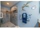 Updated bathroom with walk-in shower, tile flooring, and modern fixtures at 2431 Kensington Greens Dr # 0, Sun City Center, FL 33573