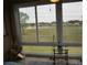 Sunroom showcasing a serene golf course view at 2431 Kensington Greens Dr # 0, Sun City Center, FL 33573