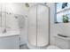 Clean bathroom with a rounded glass shower and white vanity at 2545 2Nd N Ave, St Petersburg, FL 33713