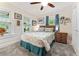 Cozy bedroom with a queen-size bed, teal accents, and ample natural light at 2545 2Nd N Ave, St Petersburg, FL 33713