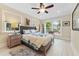 Charming bedroom with plush bed, wood-look floors, and large windows at 2545 2Nd N Ave, St Petersburg, FL 33713