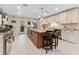 Spacious kitchen featuring granite island, stainless steel appliances, and light cabinetry at 2545 2Nd N Ave, St Petersburg, FL 33713