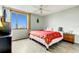 King-size bed, hardwood floor, and large window with a view at 255 Dolphin Pt Pt # 603, Clearwater Beach, FL 33767