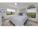 Bright bedroom with a large bed and plenty of natural light at 2749 Countryside Blvd # 18, Clearwater, FL 33761