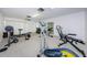 Home gym with elliptical, weights, and other equipment at 2749 Countryside Blvd # 18, Clearwater, FL 33761