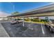 Covered carport parking for residents with additional open parking at 2749 Countryside Blvd # 18, Clearwater, FL 33761