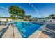 Community pool with plenty of space for relaxing and swimming at 2749 Countryside Blvd # 18, Clearwater, FL 33761