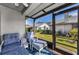 Enjoyable screened-in porch with patio furniture at 2749 Countryside Blvd # 18, Clearwater, FL 33761