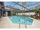 Inviting screened-in pool with ample surrounding space at 2893 Allapattah Dr, Clearwater, FL 33761