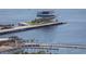 Aerial view of waterfront property with modern pier and marina at 301 1St S St # 3204, St Petersburg, FL 33701