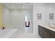 Luxurious bathroom with double vanity and walk-in shower at 301 1St S St # 3204, St Petersburg, FL 33701