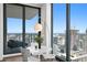 Modern dining area with city views and balcony access at 301 1St S St # 3204, St Petersburg, FL 33701