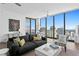 Modern living room with floor to ceiling windows and city views at 301 1St S St # 3204, St Petersburg, FL 33701