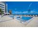 Resort-style swimming pool with plenty of lounge chairs at 301 1St S St # 3204, St Petersburg, FL 33701