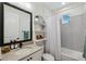 Simple bathroom with a bathtub and herringbone tile at 3809 Lajuana Blvd, Wesley Chapel, FL 33543