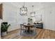 Elegant dining room with round table and seating at 3809 Lajuana Blvd, Wesley Chapel, FL 33543