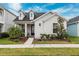 Charming craftsman style home with landscaped front yard at 3809 Lajuana Blvd, Wesley Chapel, FL 33543