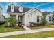 Two-story house with welcoming front porch at 3809 Lajuana Blvd, Wesley Chapel, FL 33543