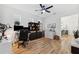 Home office with hardwood floors and ceiling fan at 3809 Lajuana Blvd, Wesley Chapel, FL 33543