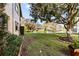 Backyard view of canal and lush landscaping at 3833 Lighthouse Way, New Port Richey, FL 34652