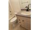 Clean bathroom with vanity, drawers, and toilet at 391 Airport E Ave # 403, Venice, FL 34285