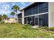 Building exterior with lush landscaping at 391 Airport E Ave # 403, Venice, FL 34285