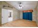 Bedroom with bamboo flooring and access to another room at 4228 Spring Way Cir, Valrico, FL 33596