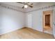 Bright bedroom featuring wood floors and a window at 4228 Spring Way Cir, Valrico, FL 33596