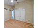 Bedroom with hardwood floors and ample closet space at 4228 Spring Way Cir, Valrico, FL 33596