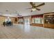 Spacious dining room with built-in shelving and window seating at 4228 Spring Way Cir, Valrico, FL 33596