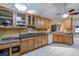 Bright kitchen with ample cabinetry and granite countertops at 4228 Spring Way Cir, Valrico, FL 33596