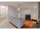 Living room showcasing hardwood floors and a view into the kitchen at 4228 Spring Way Cir, Valrico, FL 33596